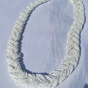 White multi-strand beaded necklace